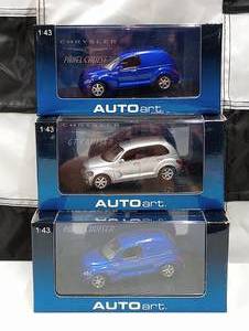 lot 395 image: Autoart 143rd Scale Die Cast Cars