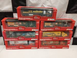 lot 402 image: Racing Champions 187th Scale Die Cast  Racing Team Transporter