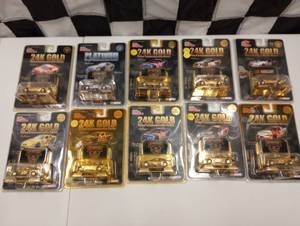 lot 408 image: Racing Champions 164th Scale  24K Gold Plated Commemorative Series