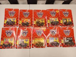 lot 411 image: Racing Champions 50th Anniversary 164th Scale Die Cast Car, Stand, and Collector Card