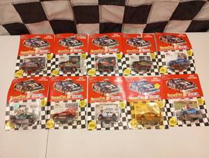lot 425 image: Racing Champions 164th Scale Die Cast Cars With Collector Card And Stand
