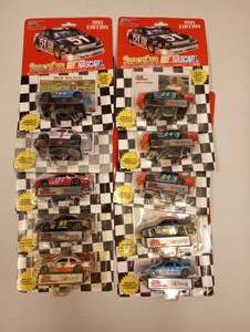lot 427 image: Racing Champions 164th Scale Die Cast Cars With Collector Card And Stand