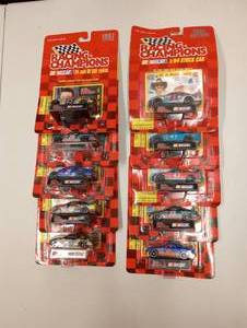 lot 429 image: Racing Champion 164th Scale Die Cast Cars With Collector Card And Stand