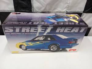 lot 446 image: gmp Street Heat 1987 Mustang LX Hatchback 118th Scale Die Cast Car