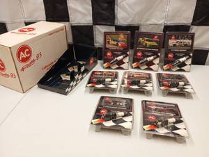lot 458 image: Limited Edition AC Spark Plugs And Trading Card