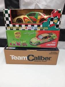 lot 462 image: Assorted Team CaliberAction Racing 124th Scale Die Cast Car Coin Banks