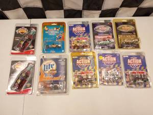lot 486 image: Assorted Action Racing 164th Scale Die Cast Cars.