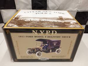 lot 520 image: Gearbox Collectible NYPD 1912 Model T Delivery Truck Die Cast Truck