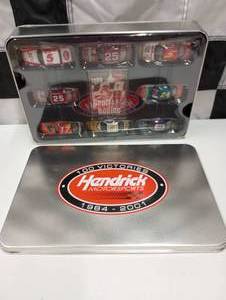 lot 540 image: Hendrick Motor Sports Celebrate The 100th Win Tin With 164th Scale Die Cast Cars