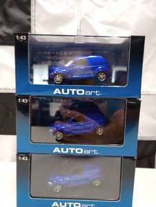 lot 577 image: (3) Autoart 43rd Scale Chrysler Panel Cruiser Die Cast Cars