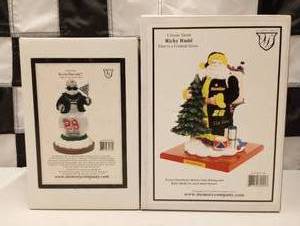 lot 655 image: Assorted Nascar Christmas Figures.