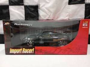 lot 680 image: Jada Toys 118 Toyota Celica Die Cast Car