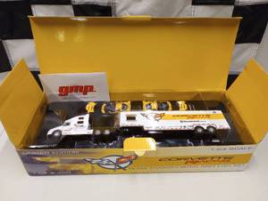 lot 688 image: gmp Corvette Racing Team Transporter And Car Set 164th Scale Die Cast
