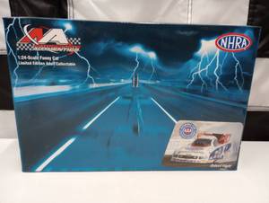 lot 703 image: Action Racing 124th Scale Robert Hight #5 Funny Car Die Cast