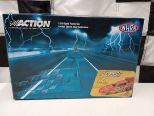 lot 705 image: Action Racing 124th Scale Cruz Pedregon #10 Funny Car Die Cast