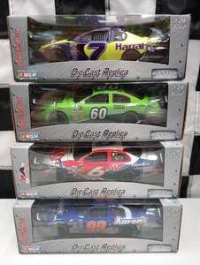 lot 722 image: Team Caliber Pit Stop 124th Scale Die Cast Cars,