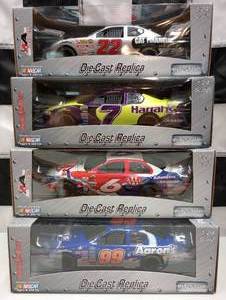 lot 723 image: Team Caliber Pit Stop 124th Scale Die Cast Cars