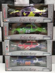 lot 724 image: Team Caliber Pit Stop 124th Scale Die Cast Cars