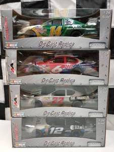 lot 726 image: Team Caliber Pit Stop 124th Scale Die Cast Cars