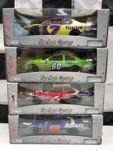 lot 727 image: Team Caliber Pit Stop 124th Scale Die Cast Cars