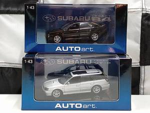 lot 828 image: (2) Autoart Subaru 143rd Scale Die Cast Cars