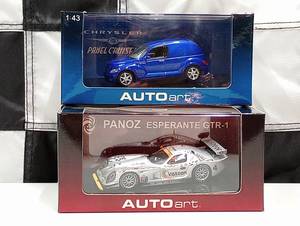 lot 830 image: (2) Autoart  143rd Scale Die Cast Cars