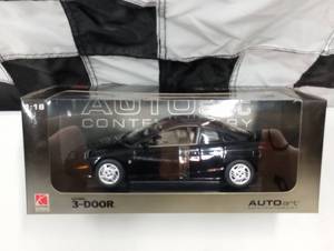 lot 837 image: Autoart  Contemporary Saturn Coupe  118th  Scale  Die Cast Car ,