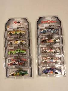 lot 744 image: Assorted Team Caliber Pit Stop 164th Scale Die Cast Cars,