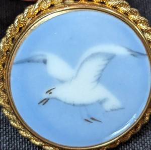 lot 12 image: Bing and Grndahl Porcelain Seagull Gold Filled PendantBrooch