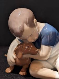 lot 14 image: Bing and Grndahl Boy and Dachshund Porcelain Figurine
