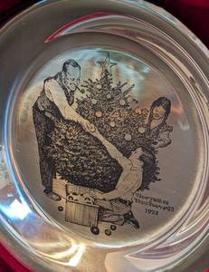 lot 24 image: 1973 Norman Rockwell Solid Sterling Silver Trimming the Tree Plate