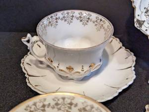 lot 53 image: Painted Porcelain Teacups and Plates