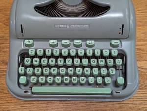 lot 66 image: Vintage Hermes 3000 Portable Typewriter