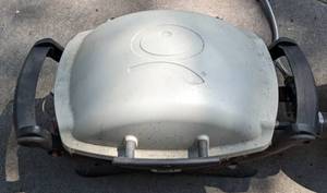 lot 191 image: Weber Portable Camping Grill and Propane Tank