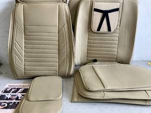 lot 136 image: AOOG Universal Beige Leatherette Car Seat Covers
