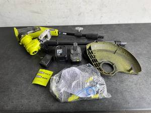 lot 289 image: RYOBI ONE 18V 13 in. Cordless Battery String TrimmerEdger with 4.0 Ah Battery and Charger