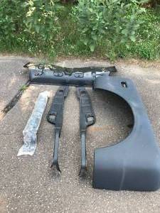 lot 8 image: Huge Parts lot Includes - 1973-1987 Chevy Truck Step side, fender NEW, 1968-72 Chevelle rear seat pan, 1968-72 gas tank brace, 1955-59 Chevy truck a pillar cab sections