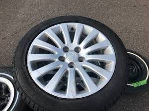 lot 56 image: Old Rims with tires - 235 - 50 - 18