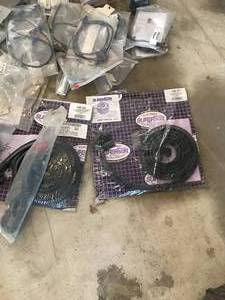 lot 79 image: Huge Parts Lot - Includes the following  Much More - New Weatherstrips, visors, wire harnesses, Misc. Trim, all new Mostly GM