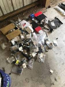lot 83 image: Huge lot of Parts - Includes  More - Misc. GM Steering Parts, Chevelle ad Camaro, AC AC Dash Vents, Dash Knobs, Rearview Mirror Brackets, Camaro Battery Tray