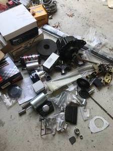 lot 98 image: Huge lot of Parts - Includes  More - V band Clamps, MSD Coils, Holley Regulators, Dakota Gauges, Mass air flow  sensor LOOK