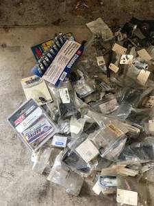 lot 100 image: Huge Parts lot -  More - Includes -- Pillet Mirror, Throttle linkage, battery terminals, alternator brackets, battery tray, fuel fittings  More
