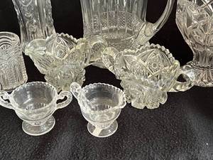 lot 15 image: Cut Glass Water Pitcher, Vases, Creamers & Sugars