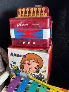 lot 30 image: Vintage Toys - Sock Monkey, Accordion, Pull-A-Tune, Raggedy Ann, Metal Top