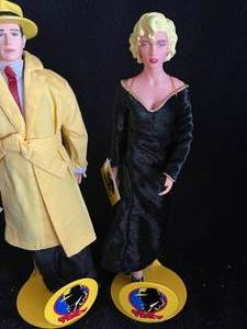 lot 51 image: Madonna & Dick Tracy Dolls on Stand with Hang Tags