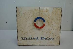 lot 44 image: Vintage United Delco cabinet wcontents