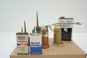 lot 49 image: Vintage oil squirt cans