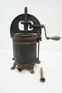 lot 66 image: Cast iron sausage stuffer