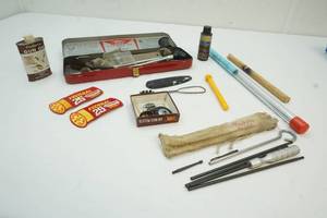 lot 73 image: Outers rifle cleaning kit and misc.