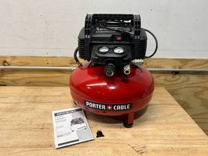 lot 33 image: PORTER-CABLE 6 Gal. 150 PSI Portable Electric Pancake Air Compressor
